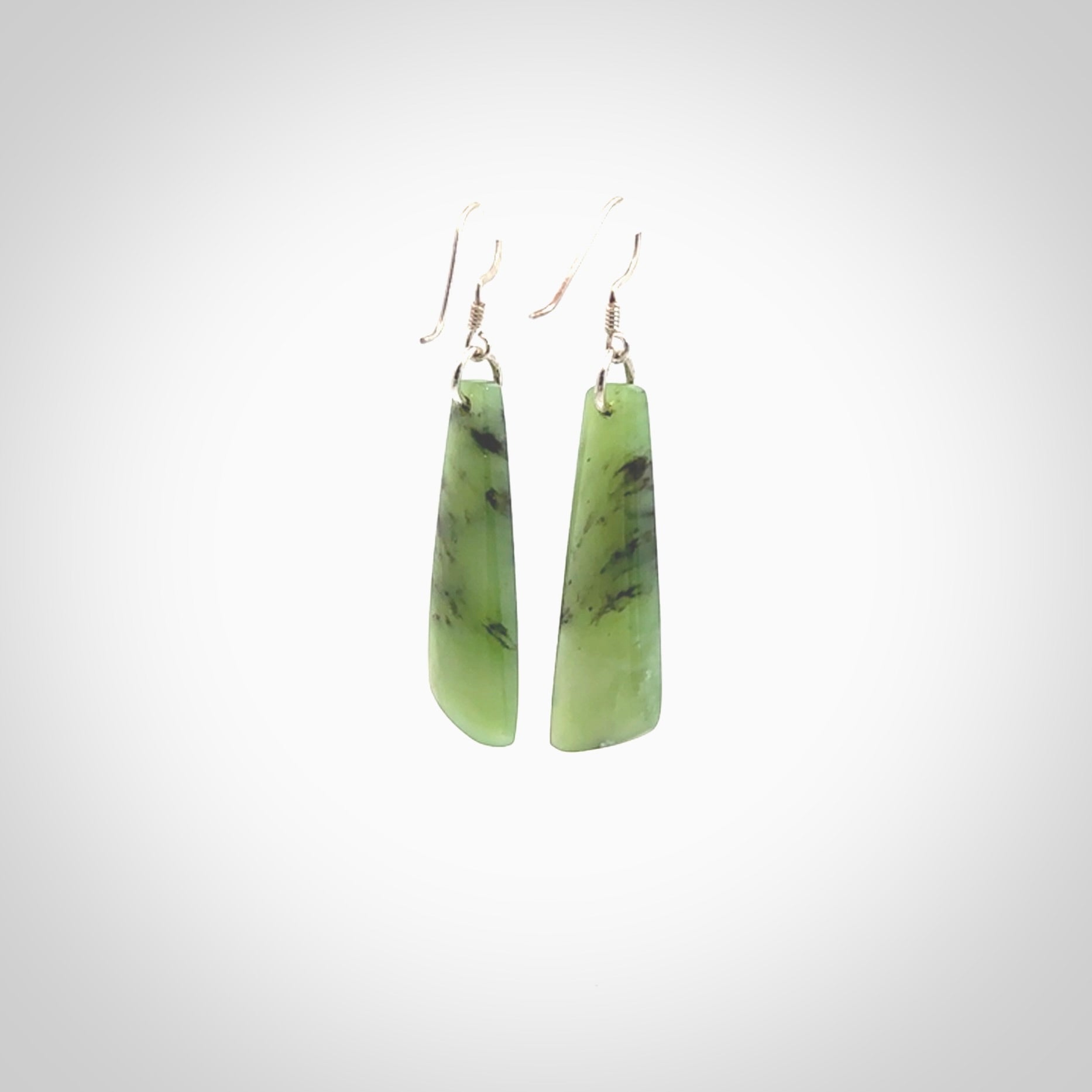 Hand carved New Zealand Jade drop earrings. New Zealand Jade earrings.