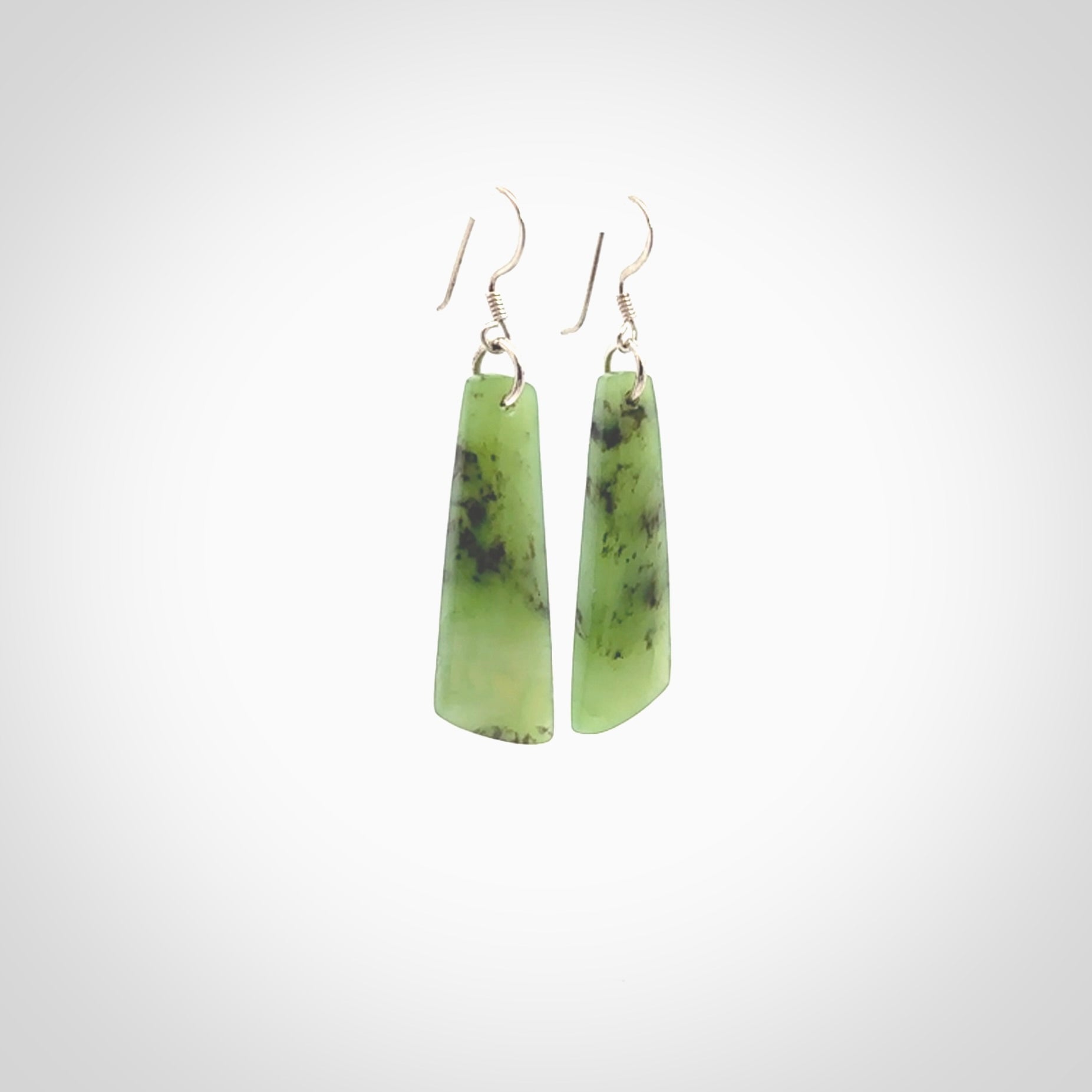 Hand carved New Zealand Jade drop earrings. New Zealand Jade earrings.