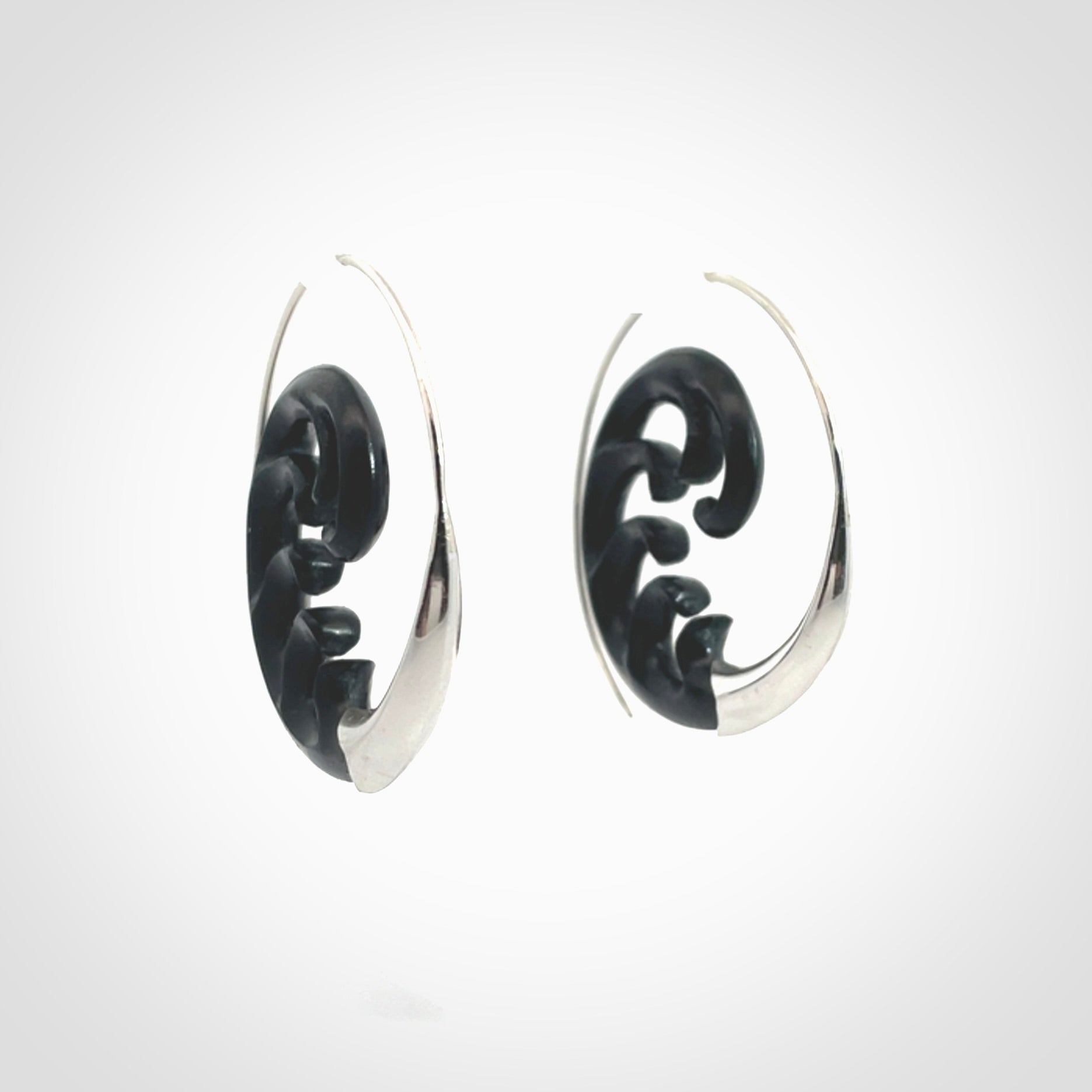 Hand carved hoop earrings, made from Black Jade with sterling silver. An NZ Pacific design. Large Black Jade and Silver hoop earrings.