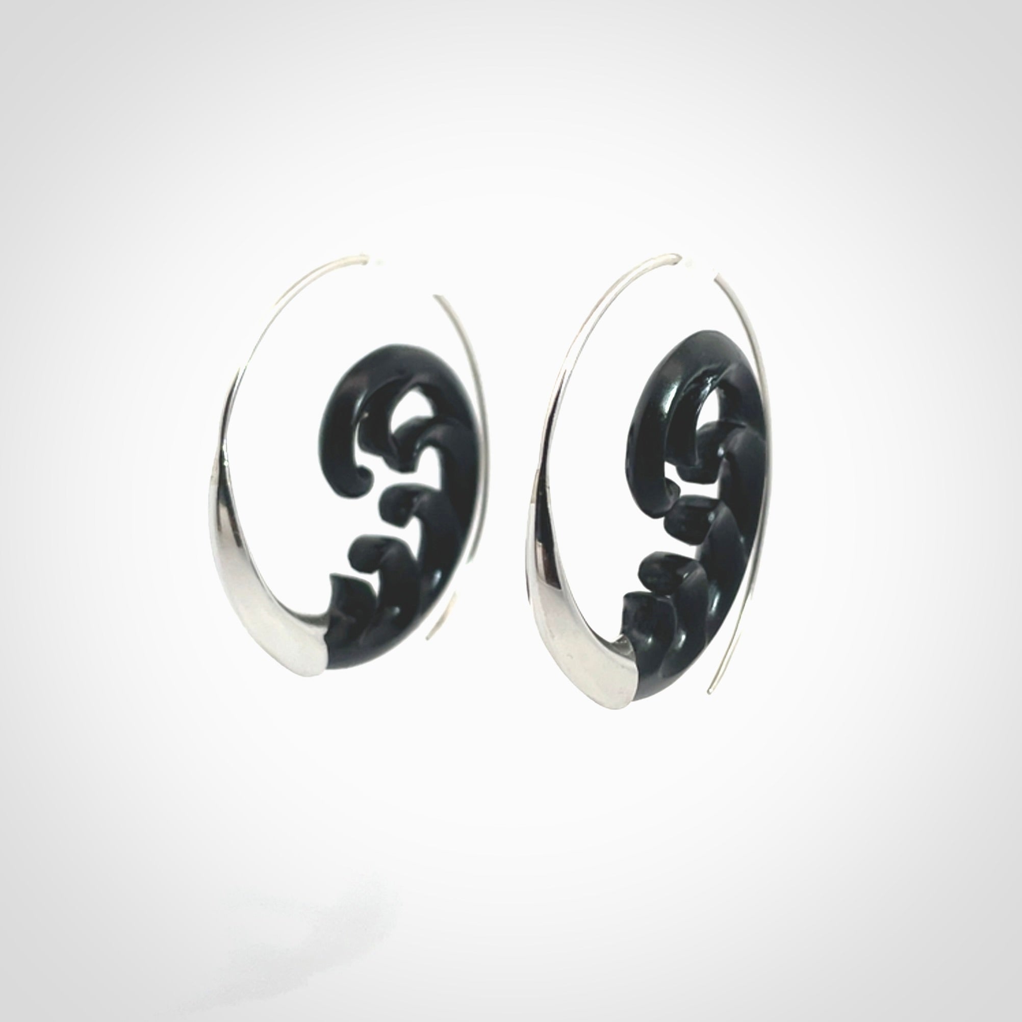 Hand carved hoop earrings, made from Black Jade with sterling silver. An NZ Pacific design. Large Black Jade and Silver hoop earrings.