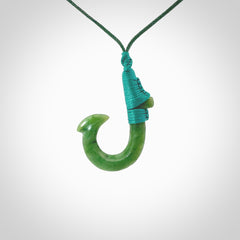 These pendants are hand carved, green jade Hawaiian hooks or Makau pendants. They are beautifully finished in a high polish and bound with an adjustable cord. Hand made jewellery that make the most wonderful gifts. Free shipping worldwide.