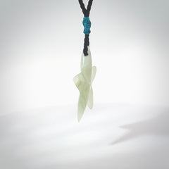 Jadeite star pendant. Star shaped necklace hand made from white Jadeite stone. Delivered on an adjustable blue cord and packaged in a woven kete pouch.