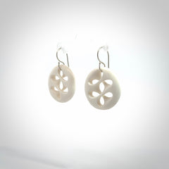 Hand carved bone earrings. Hand made by Amanda Thompson. One only bone earrings. Real bone art to wear. Free Shipping worldwide.