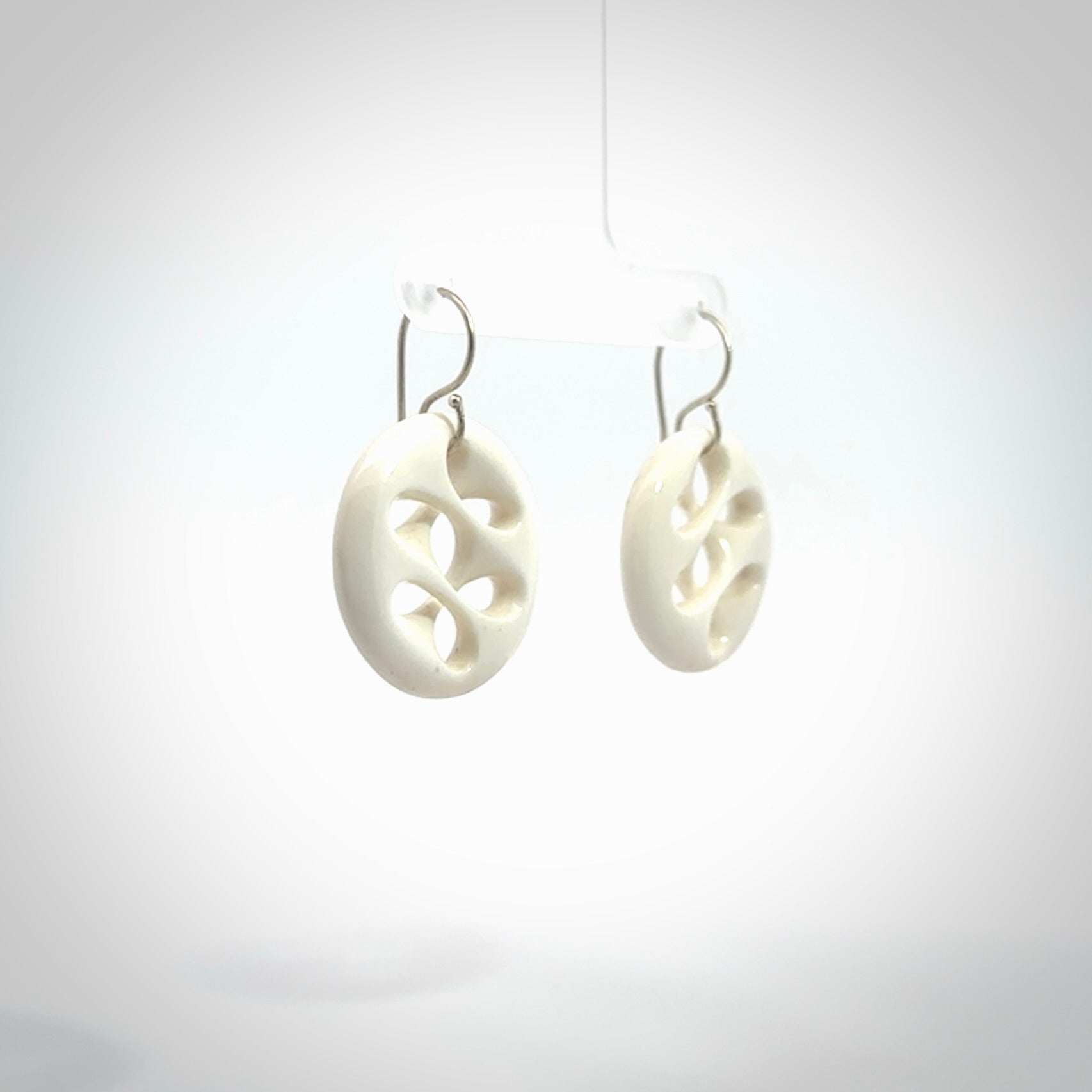 Hand carved bone earrings. Hand made by Amanda Thompson. One only bone earrings. Real bone art to wear. Free Shipping worldwide.