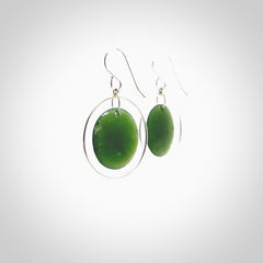 Hand carved medium New Zealand jade circle earrings. Made by NZ Pacific from real jade. Online jewellery for sale online by NZ Pacific.