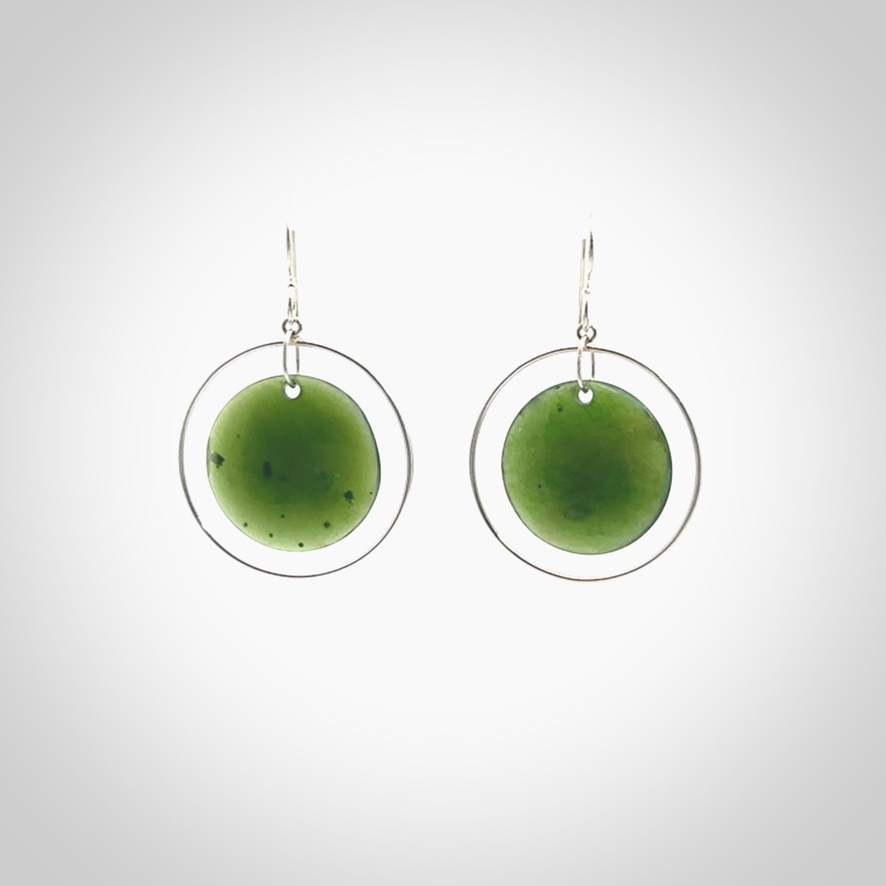 Hand carved medium New Zealand jade circle earrings. Made by NZ Pacific from real jade. Online jewellery for sale online by NZ Pacific.