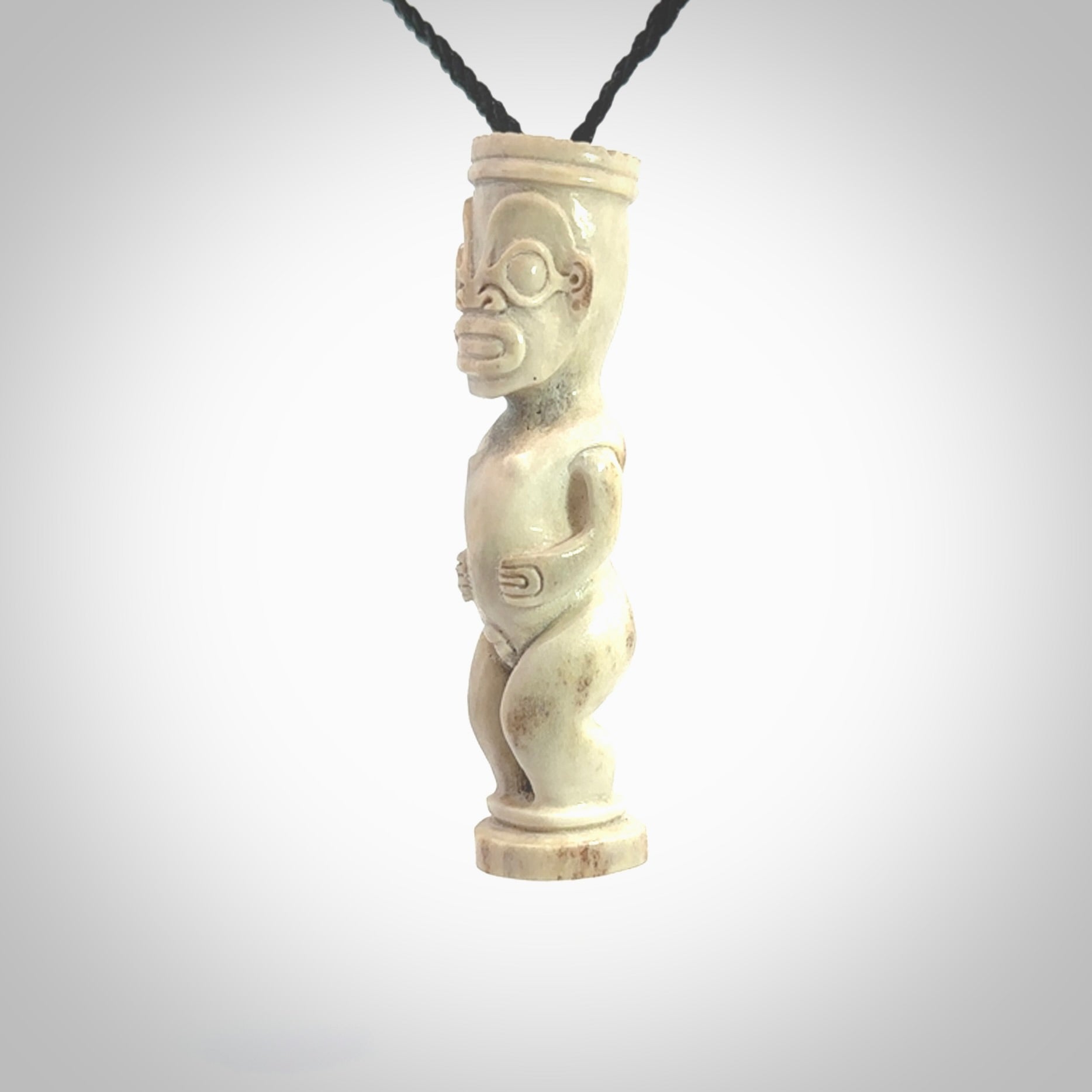 A traditional Papua New Guinea design carving , hand made for us from bone. This is a work of art and is a collectable piece of traditional bone carving. It can be worn as a special piece of jewellery or displayed. This is art made to wear at its finest.