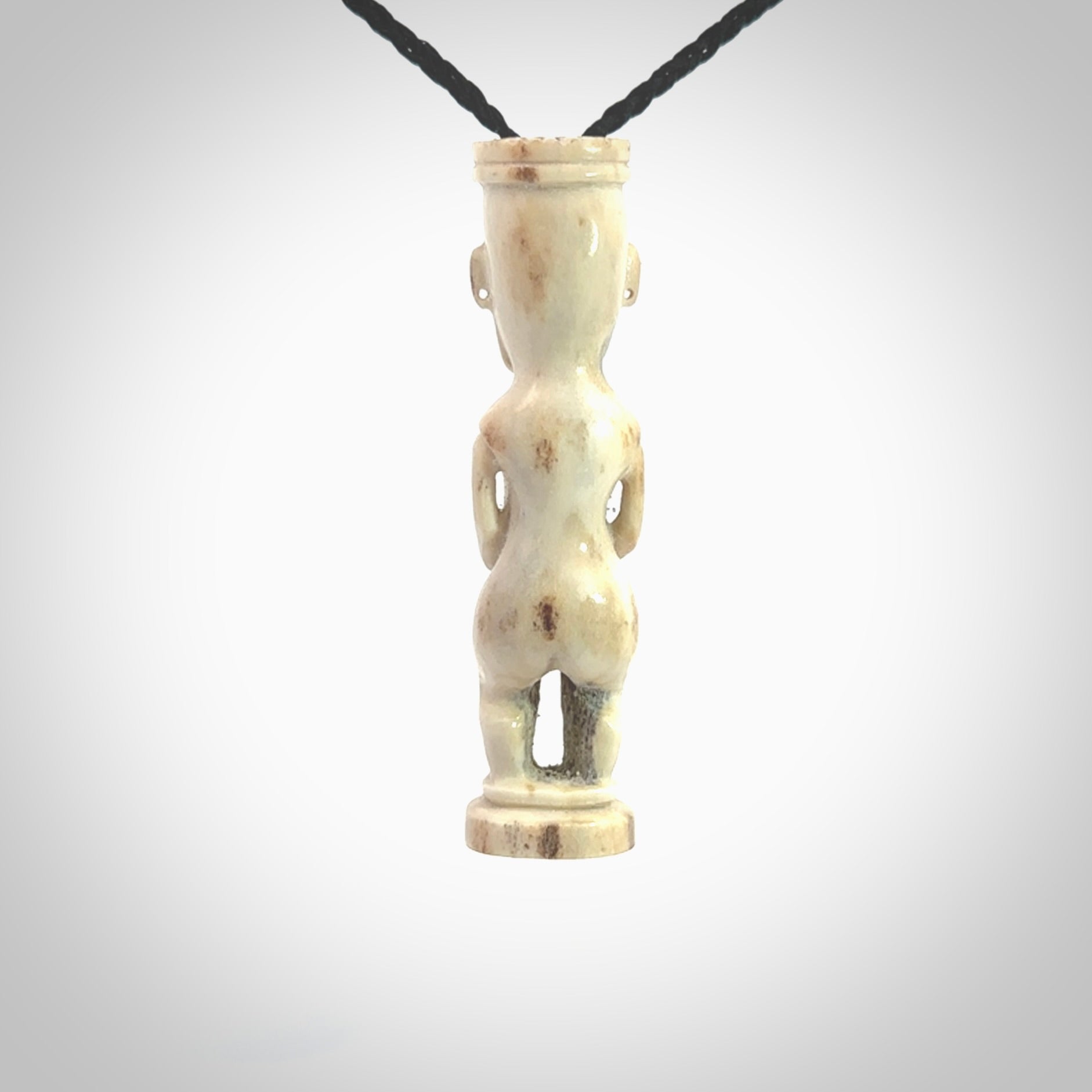 A traditional Papua New Guinea design carving , hand made for us from bone. This is a work of art and is a collectable piece of traditional bone carving. It can be worn as a special piece of jewellery or displayed. This is art made to wear at its finest.