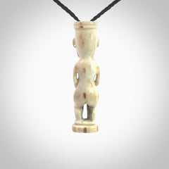 A traditional Papua New Guinea design carving , hand made for us from bone. This is a work of art and is a collectable piece of traditional bone carving. It can be worn as a special piece of jewellery or displayed. This is art made to wear at its finest.