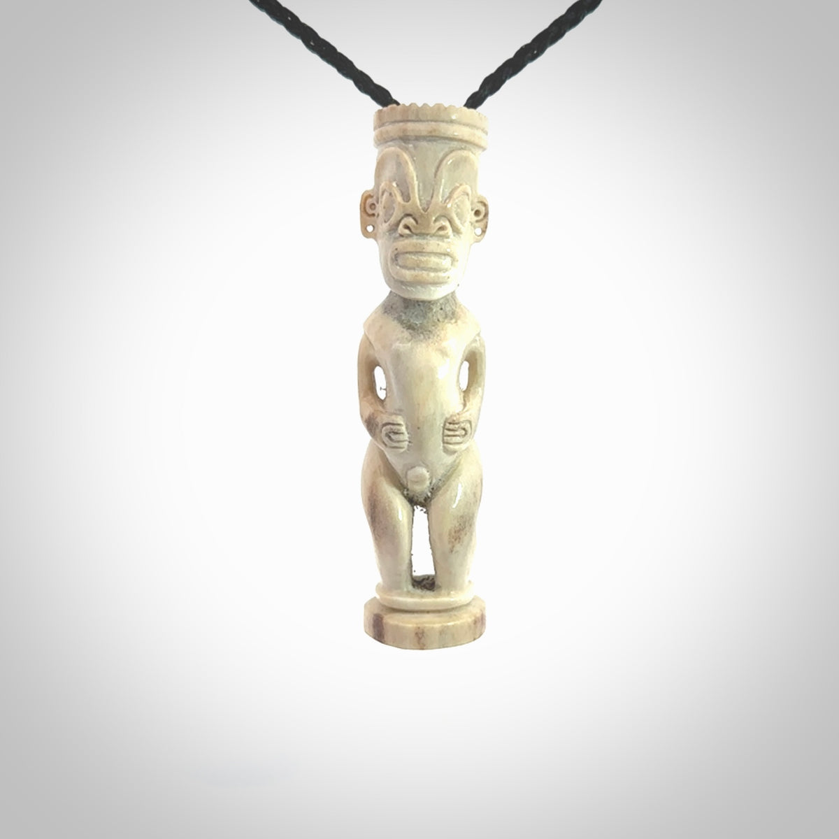 A traditional Papua New Guinea design carving , hand made for us from bone. This is a work of art and is a collectable piece of traditional bone carving. It can be worn as a special piece of jewellery or displayed. This is art made to wear at its finest.