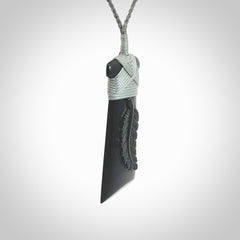 A gorgeous black jade toki pendant, carved with New Zealand's silver fern in relief. This is a pendant we designed for the Rugby World Cup. It is the fern that our national team the All Blacks wear on their jerseys, and the black is the colour of their team uniform. A fantastic and visually striking pendant, designed and carved by NZ Pacific.