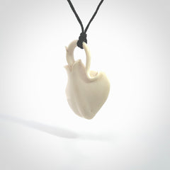 Hand carved stingray pendant. Natural bone pendants from NZ Pacific.