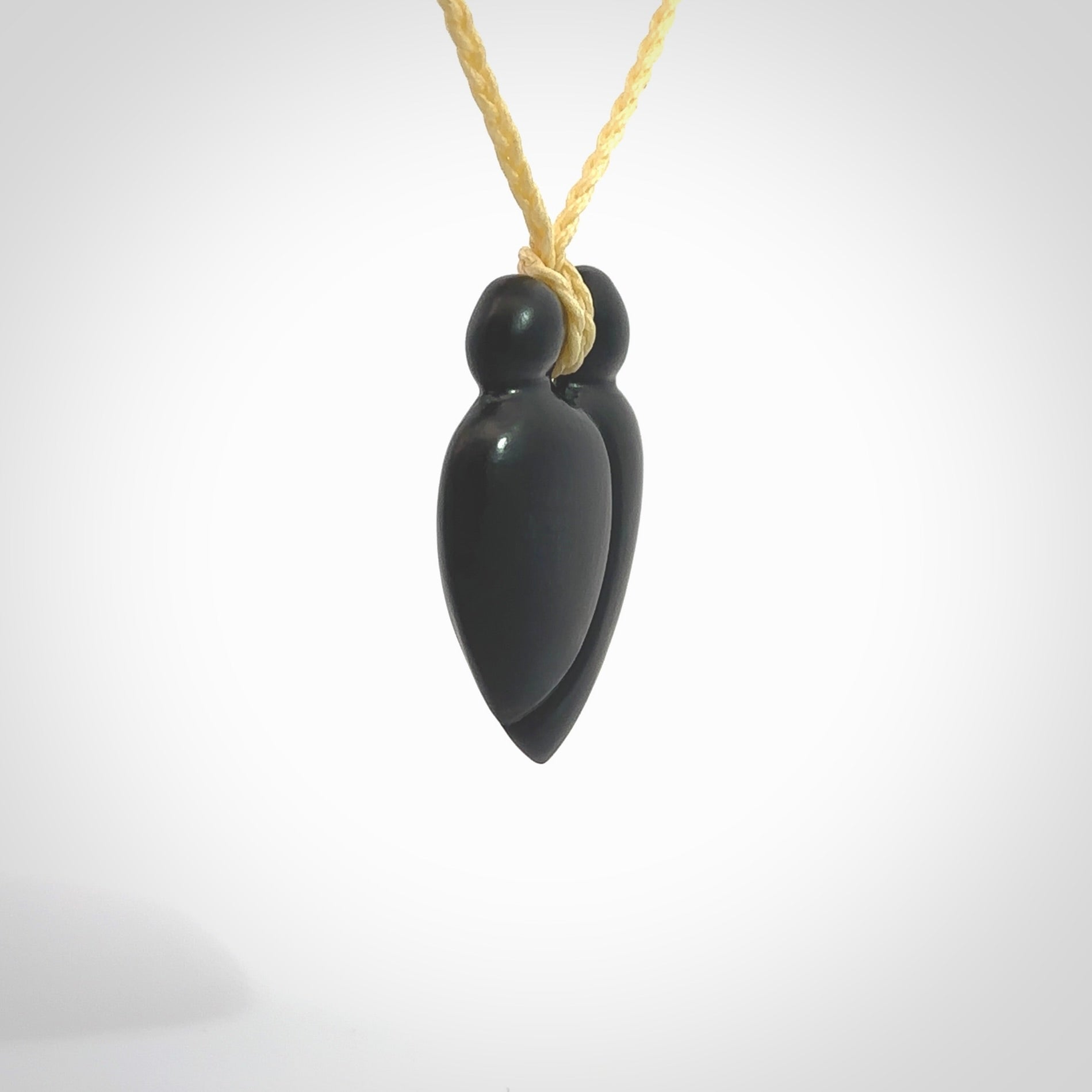 This is a hand carved love heart pendant made from a gorgeous and striking piece of black jade stone. This is a superbly carved and very unique piece of contemporary jewellery. For sale online from NZ Pacific.