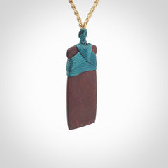 This is a beautiful hand carved Red Jasper Stone toki pendant. A really cool piece that is made from this rare and beautiful material. The red jasper has a very distinctive look and each piece is different. We ship this worldwide and the cost of shipping is included in the price. Provided with adjustable cords and packaged in a woven kete pouch.