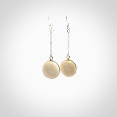 Hand made woolly mammoth tusk earrings. Made by NZ Pacific and sale online only.