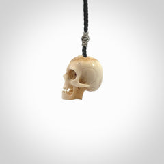 These are handmade skull pendants carved from deer antler. A fantastic piece if you like skulls and would like a medium sized piece. The cord is adjustable so you can wear this where it suits you best. We ship these free worldwide.