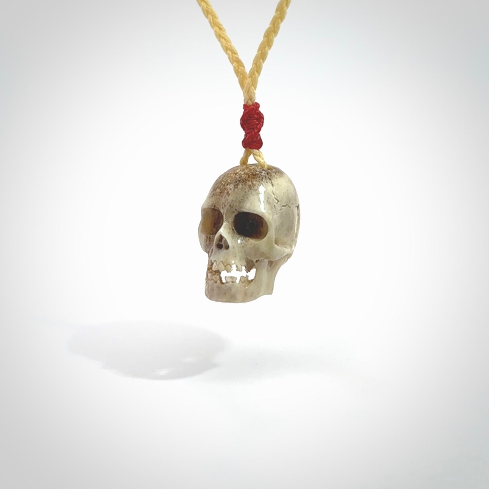 These are handmade skull pendants carved from deer antler. A fantastic piece if you like skulls and would like a medium sized piece. The cord is adjustable so you can wear this where it suits you best. We ship these free worldwide.