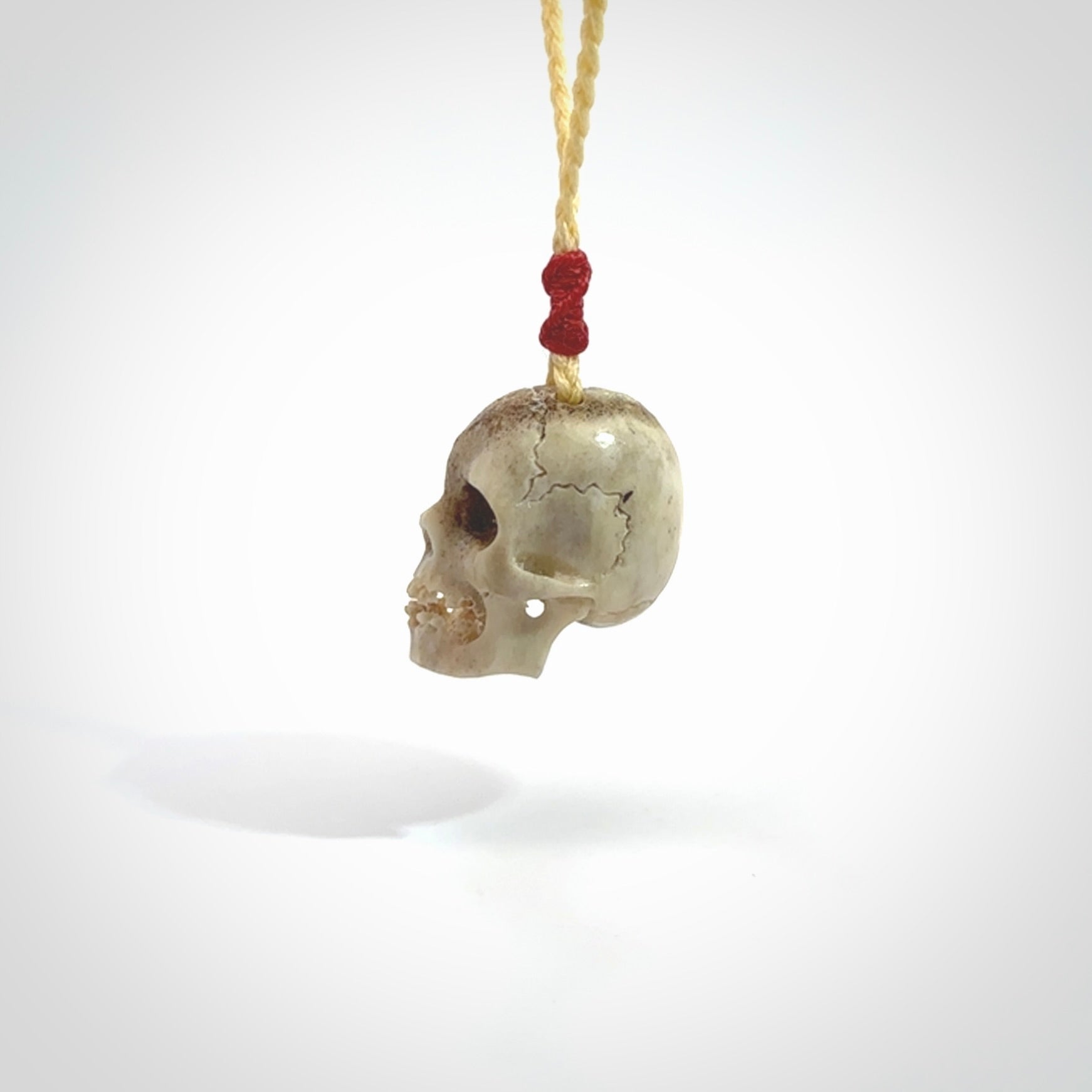 These are handmade skull pendants carved from deer antler. A fantastic piece if you like skulls and would like a medium sized piece. The cord is adjustable so you can wear this where it suits you best. We ship these free worldwide.