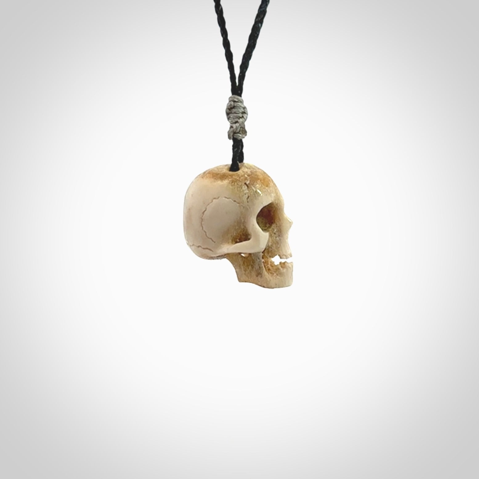 These are handmade skull pendants carved from deer antler. A fantastic piece if you like skulls and would like a medium sized piece. The cord is adjustable so you can wear this where it suits you best. We ship these free worldwide.