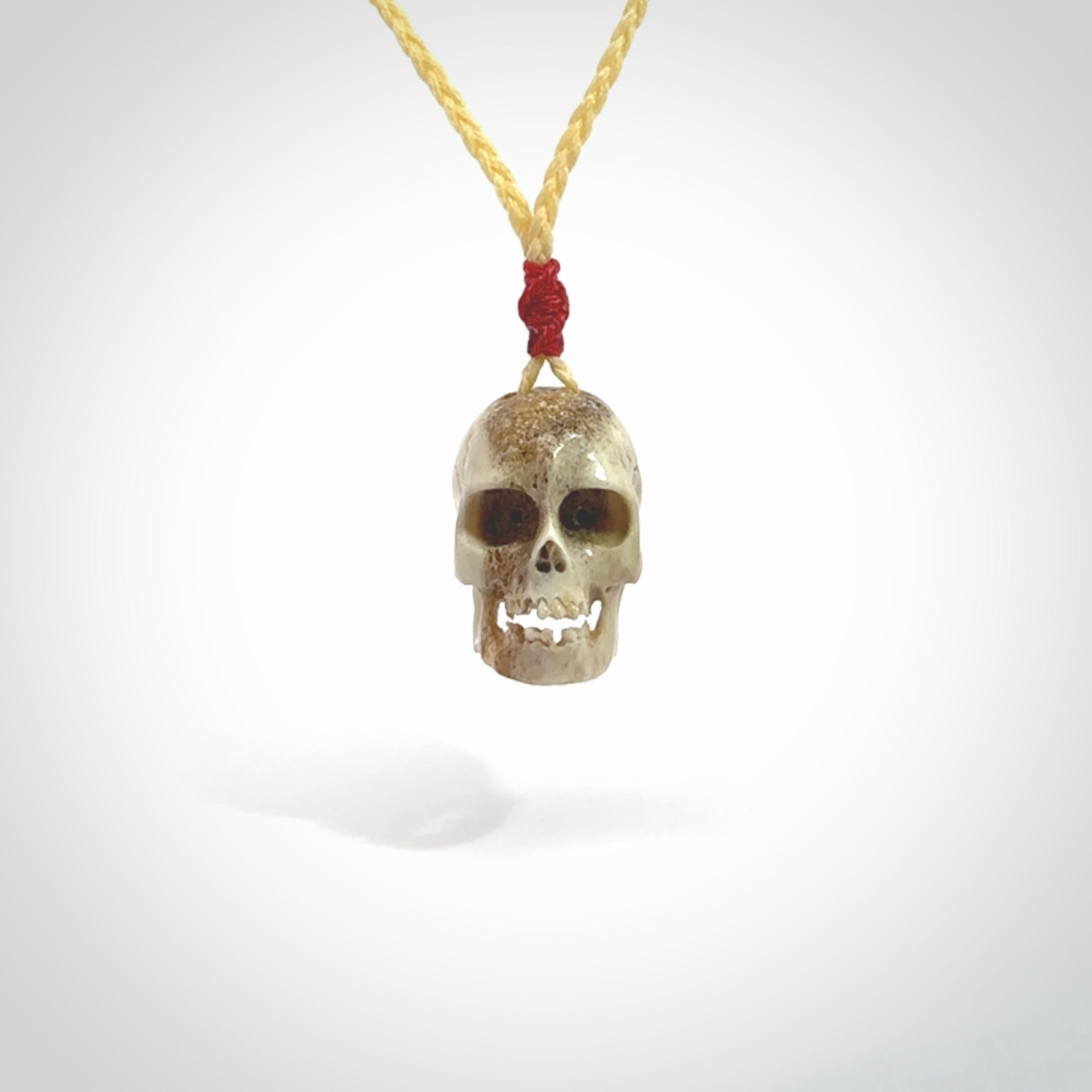 These are handmade skull pendants carved from deer antler. A fantastic piece if you like skulls and would like a medium sized piece. The cord is adjustable so you can wear this where it suits you best. We ship these free worldwide.