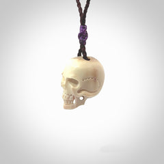 These are handmade skull pendants carved from deer antler. A fantastic piece if you like skulls and would like a medium sized piece. The cord is adjustable so you can wear this where it suits you best. We ship these free worldwide.