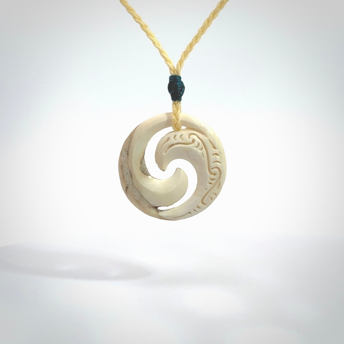 Carved koru pendant hand made in Woolly Mammoth tusk. These are a variety of colours from cream to dark brown.