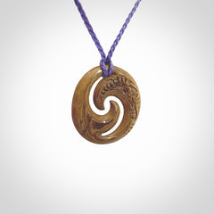 Carved koru pendant hand made in Woolly Mammoth tusk. These are a variety of colours from cream to dark brown.