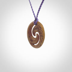 Carved koru pendant hand made in Woolly Mammoth tusk. These are a variety of colours from cream to dark brown.