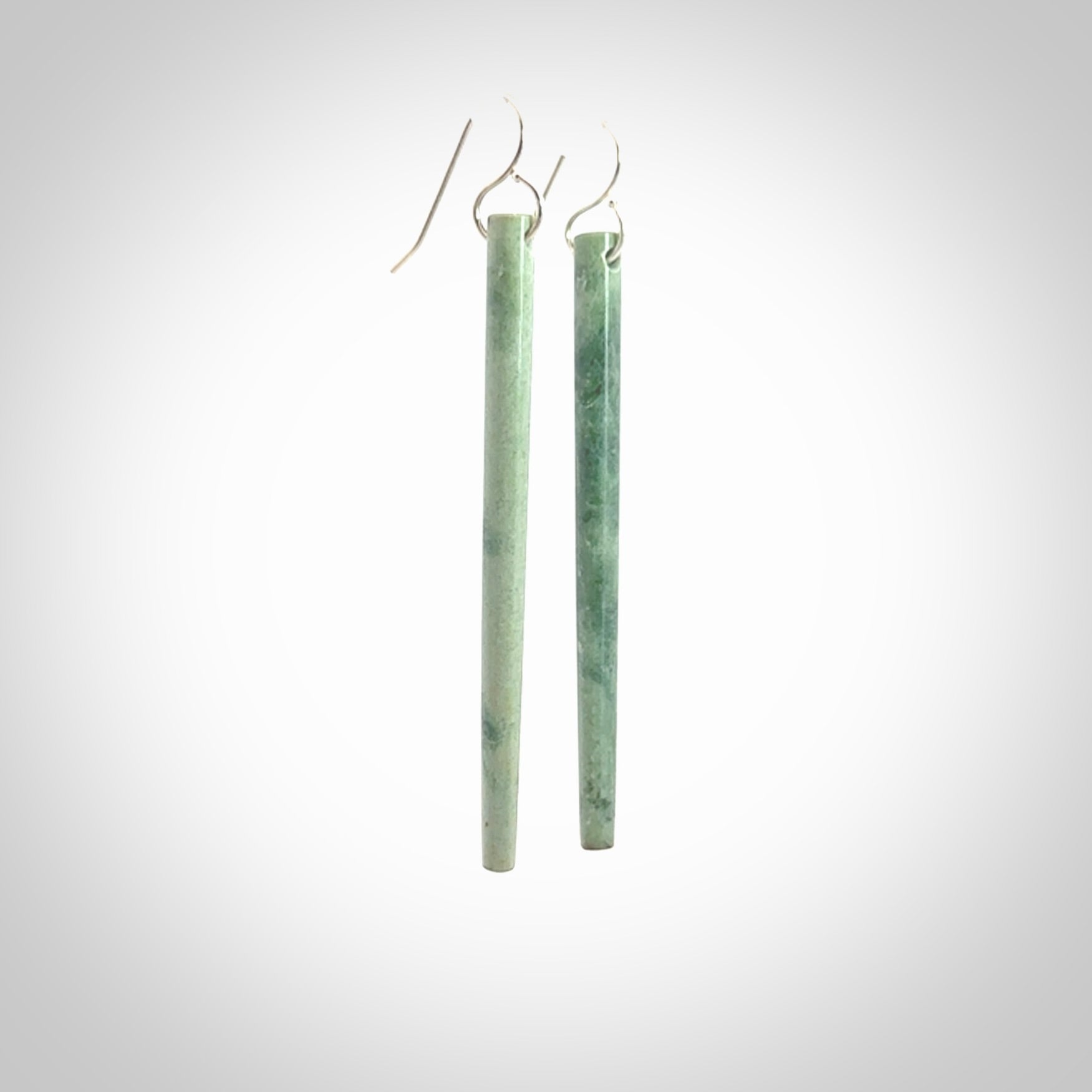 Hand crafted large, New Zealand Inanga Jade drop earrings with Sterling Silver Hooks. Jade drop earrings, packaged in a woven kete pouch.