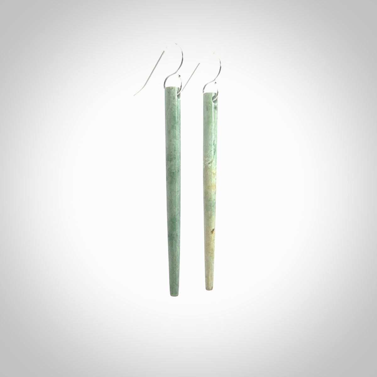 Hand crafted New Zealand Jade Inanga Jade drop earrings with Sterling Silver Hooks. Jade drop earrings, packaged in a woven kete pouch.