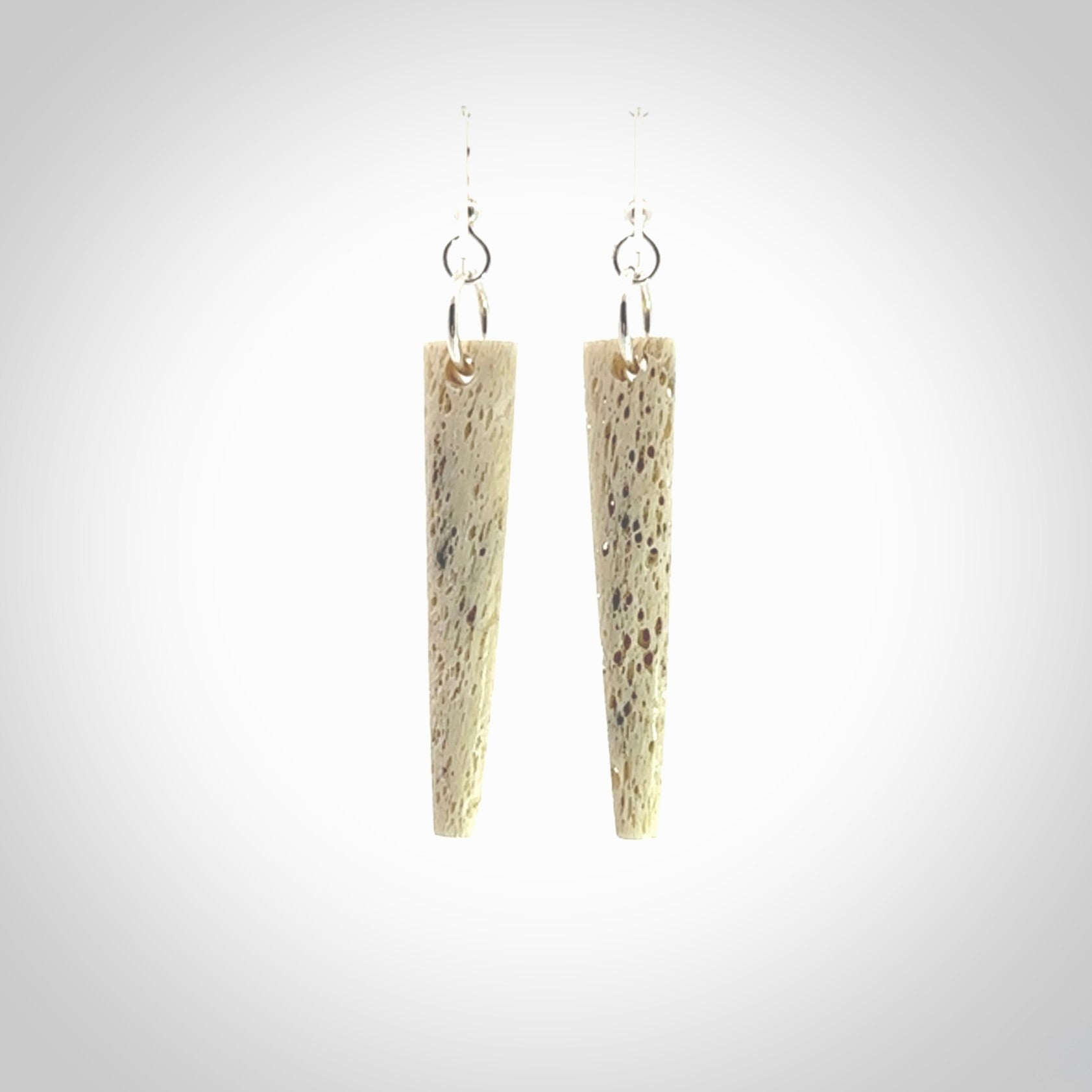 Hand carved large whalebone drop earrings hand made by Kristal Thompson. One only large whale bone drop earrings. Real whale bone art to wear. Free Shipping worldwide. One pair only, delivered in a kete pouch.