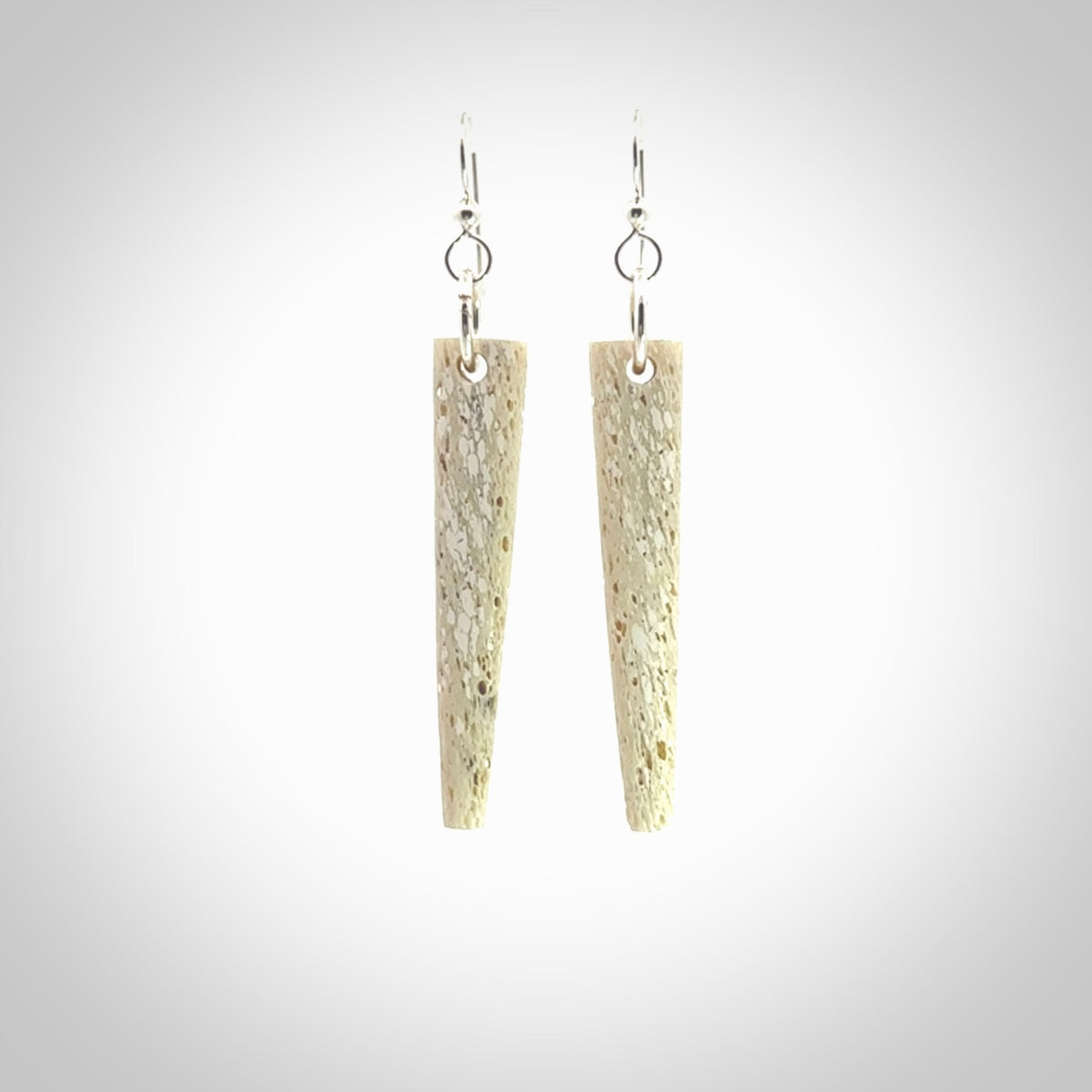 Hand carved large whalebone drop earrings hand made by Kristal Thompson. One only large whale bone drop earrings. Real whale bone art to wear. Free Shipping worldwide. One pair only, delivered in a kete pouch.