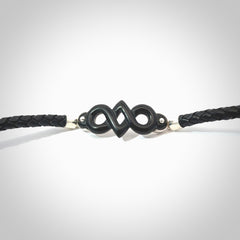 Hand carved eternity bracelet from Australian Black Jade. This is an absolutely beautiful piece of wrist jewellery, hand made by NZ Pacific. We provide this with Free Postage Worldwide.