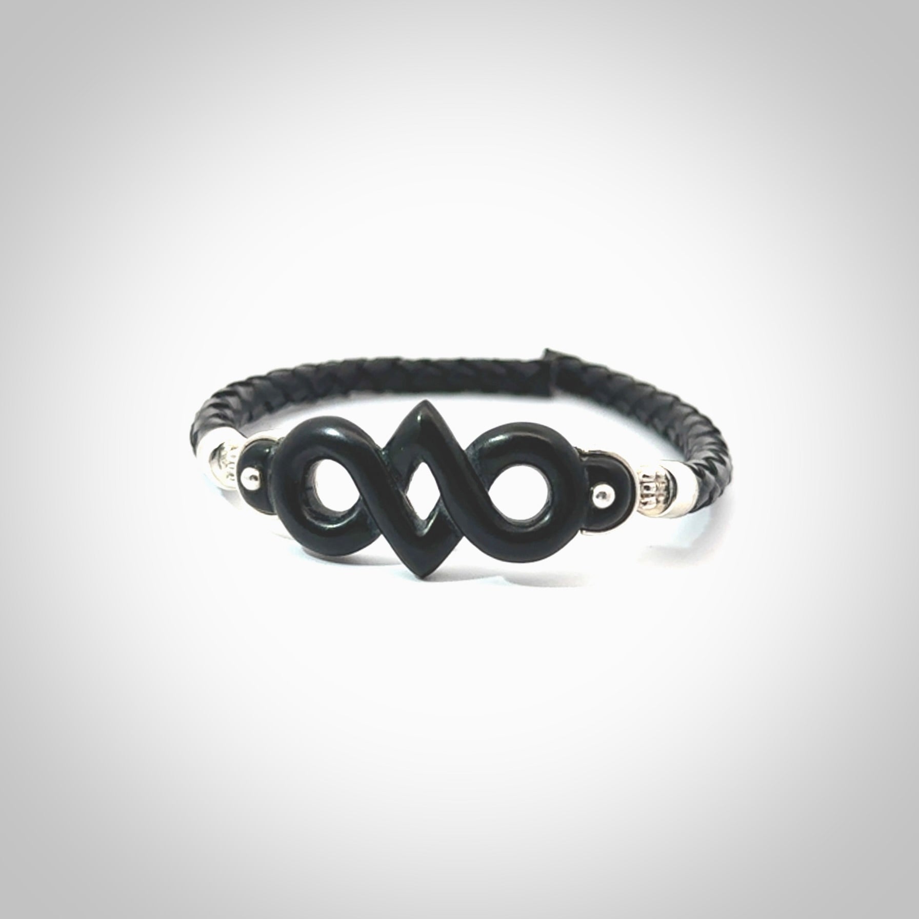 Hand carved eternity bracelet from Australian Black Jade. This is an absolutely beautiful piece of wrist jewellery, hand made by NZ Pacific. We provide this with Free Postage Worldwide.