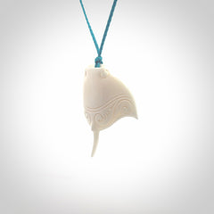 Hand carved bone manta ray pendant. Moana pendants carved by NZ Pacific. Hand made art to wear for sale online.