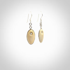 Hand carved woolly mammoth tusk earrings. Hand made by NZ Pacific for sale online.