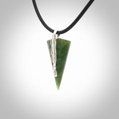 A photo of a New Zealand Jade drop pendant with sterling silver. This is a stylish statement piece - hand crafted here in New Zealand by Ana Krakosky. Unique Art to Wear. Gifts for all lovers of hand made Art to Wear.