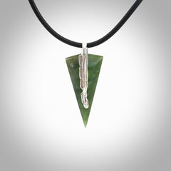 A photo of a New Zealand Jade drop pendant with sterling silver. This is a stylish statement piece - hand crafted here in New Zealand by Ana Krakosky. Unique Art to Wear. Gifts for all lovers of hand made Art to Wear.