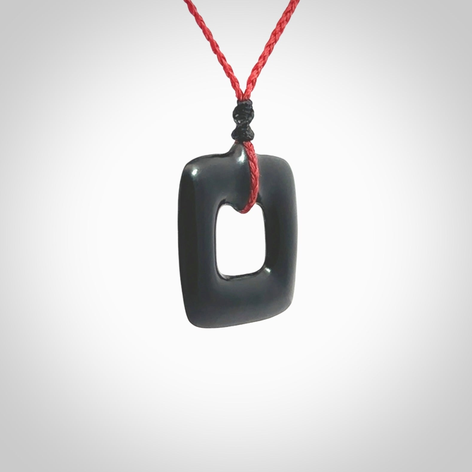 Contemporary pendant hand carved from Australian Black Jade. Designed and made by NZ Pacific. All hand carved in Black Jade and provided with adjustable cords.