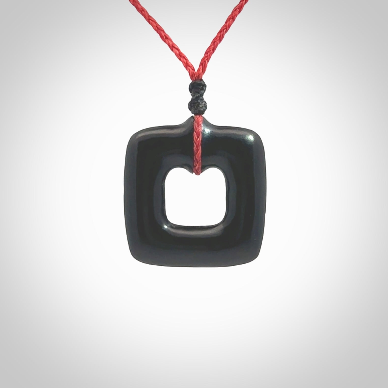 Contemporary pendant hand carved from Australian Black Jade. Designed and made by NZ Pacific. All hand carved in Black Jade and provided with adjustable cords.