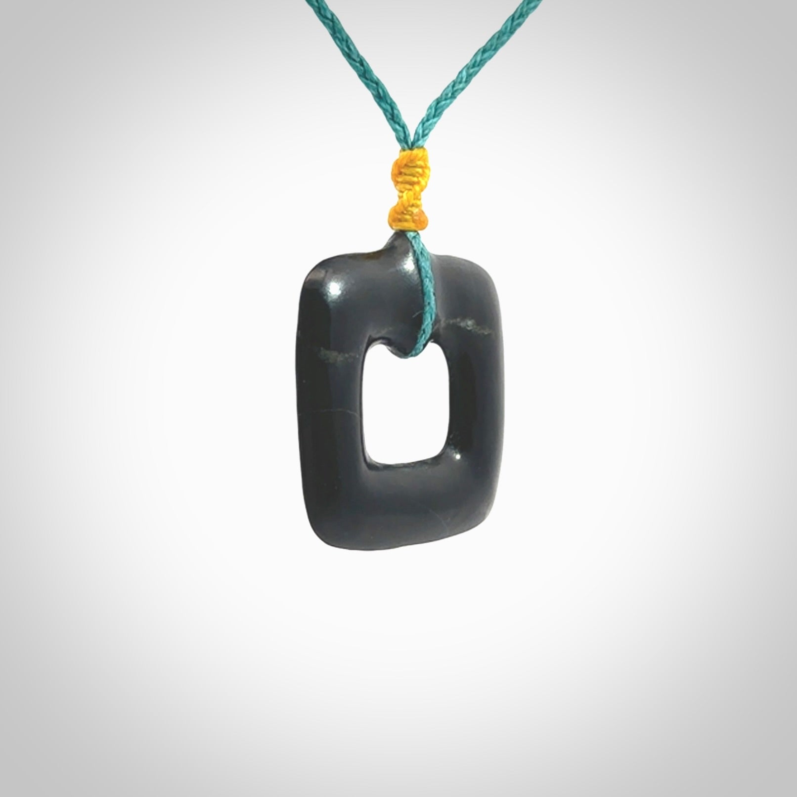 Contemporary pendant hand carved from Australian Black Jade. Designed and made by NZ Pacific. All hand carved in Black Jade and provided with adjustable cords.