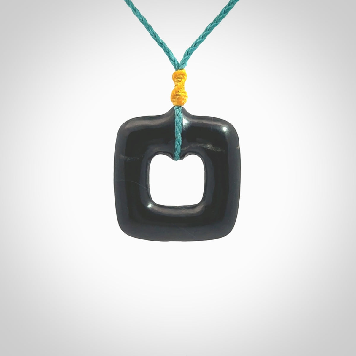 Contemporary pendant hand carved from Australian Black Jade. Designed and made by NZ Pacific. All hand carved in Black Jade and provided with adjustable cords.