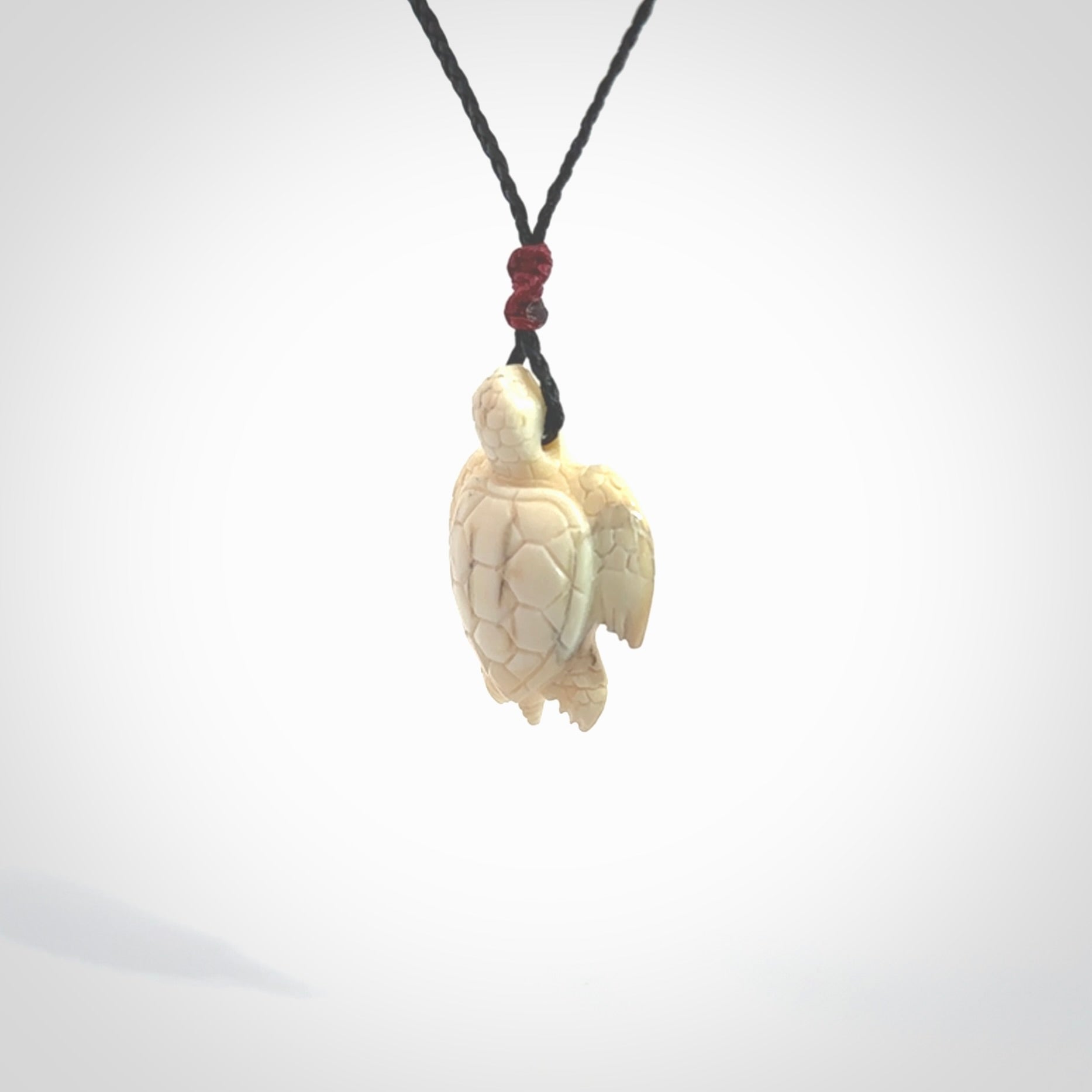 This is a beautiful hand carved woolly mammoth tusk turtle pendant. A really cool piece that is made from this rare and beautiful material. The mammoth has a very distinctive grain and each piece is different. We ship this worldwide and the cost of shipping is included in the price.