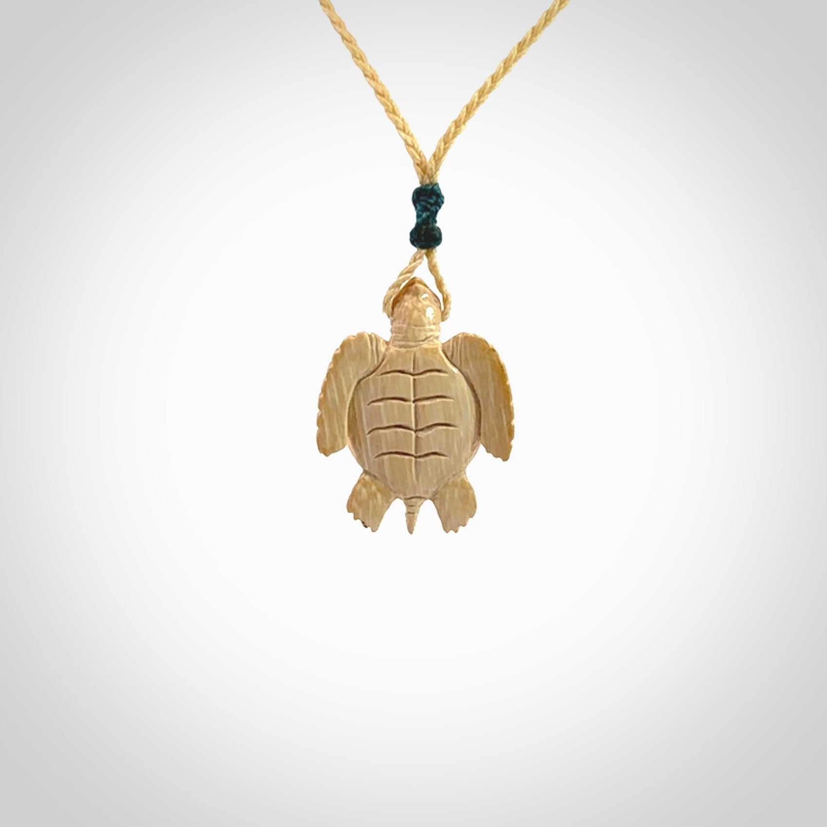 This is a beautiful hand carved woolly mammoth tusk turtle pendant. A really cool piece that is made from this rare and beautiful material. The mammoth has a very distinctive grain and each piece is different. We ship this worldwide and the cost of shipping is included in the price.