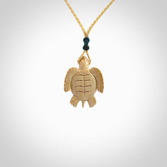 This is a beautiful hand carved woolly mammoth tusk turtle pendant. A really cool piece that is made from this rare and beautiful material. The mammoth has a very distinctive grain and each piece is different. We ship this worldwide and the cost of shipping is included in the price.