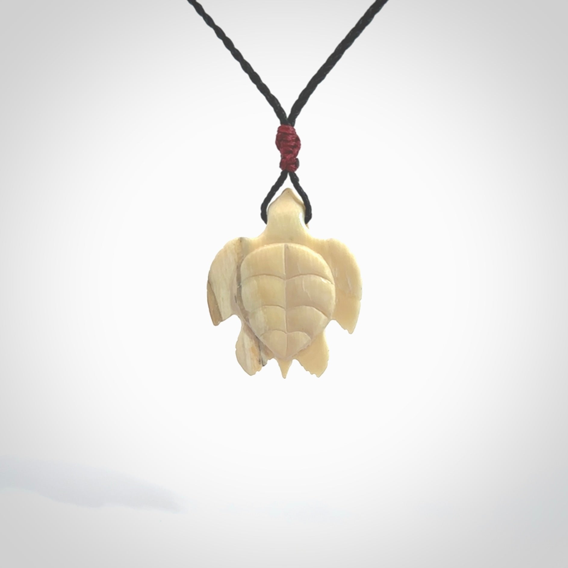 This is a beautiful hand carved woolly mammoth tusk turtle pendant. A really cool piece that is made from this rare and beautiful material. The mammoth has a very distinctive grain and each piece is different. We ship this worldwide and the cost of shipping is included in the price.