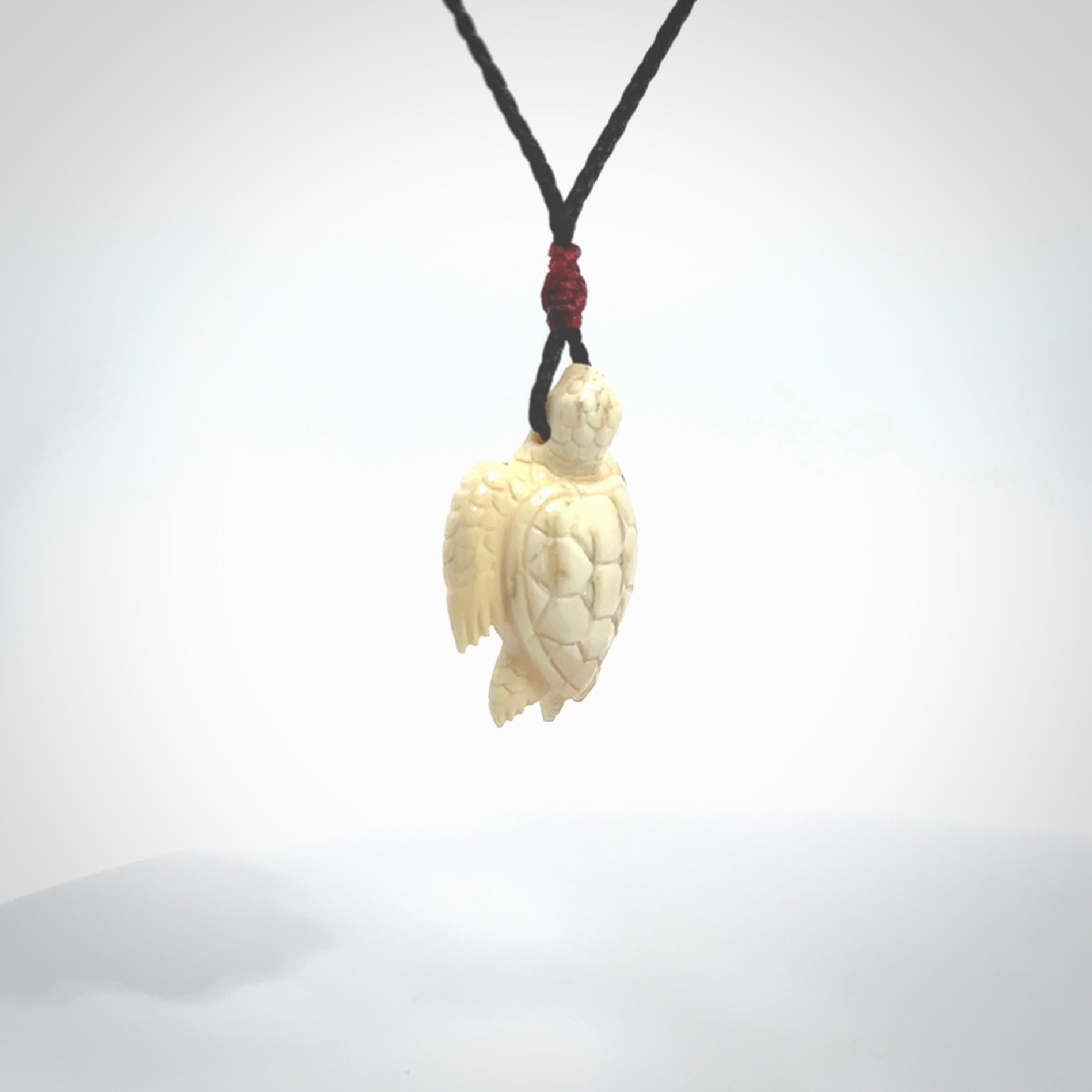 This is a beautiful hand carved woolly mammoth tusk turtle pendant. A really cool piece that is made from this rare and beautiful material. The mammoth has a very distinctive grain and each piece is different. We ship this worldwide and the cost of shipping is included in the price.