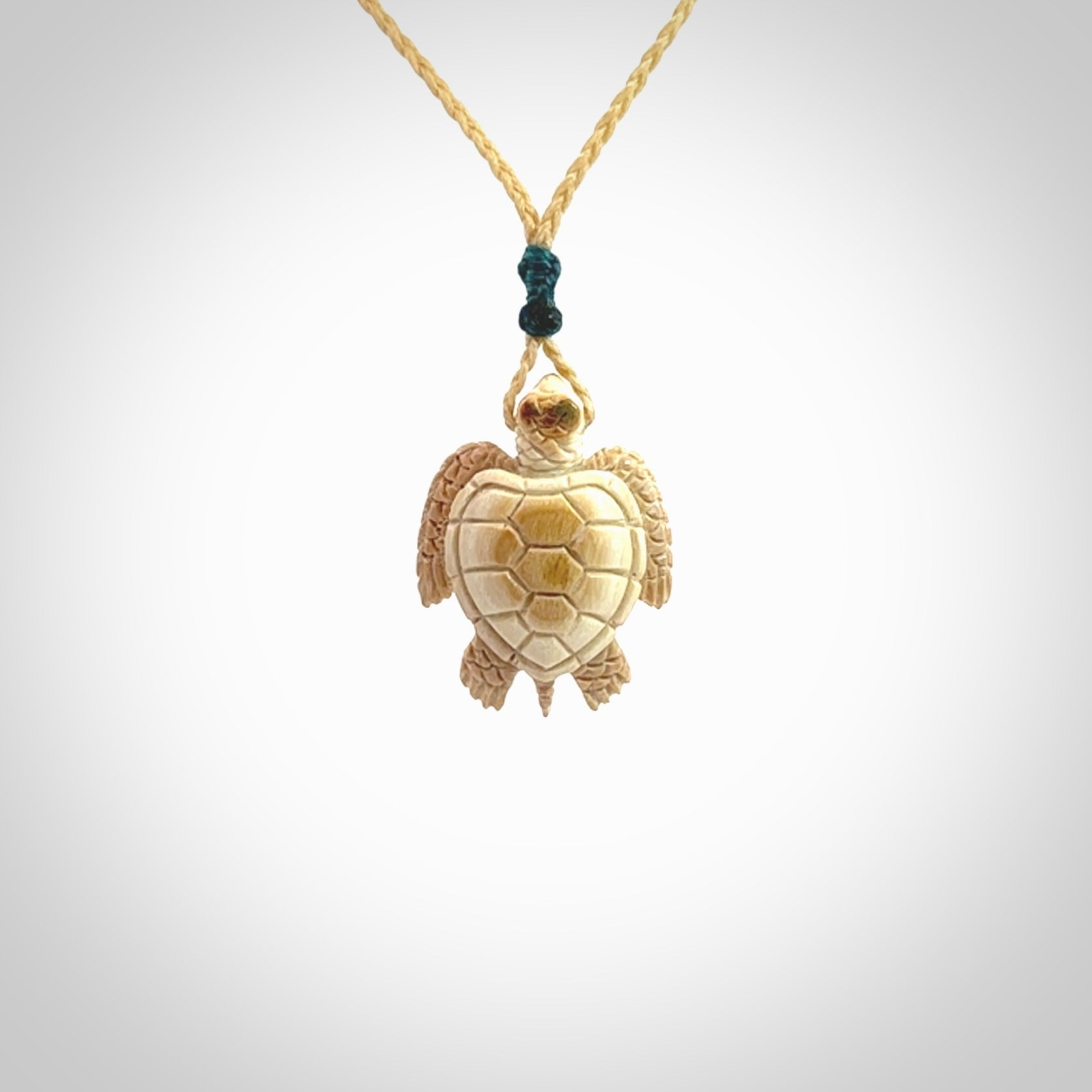 This is a beautiful hand carved woolly mammoth tusk turtle pendant. A really cool piece that is made from this rare and beautiful material. The mammoth has a very distinctive grain and each piece is different. We ship this worldwide and the cost of shipping is included in the price.