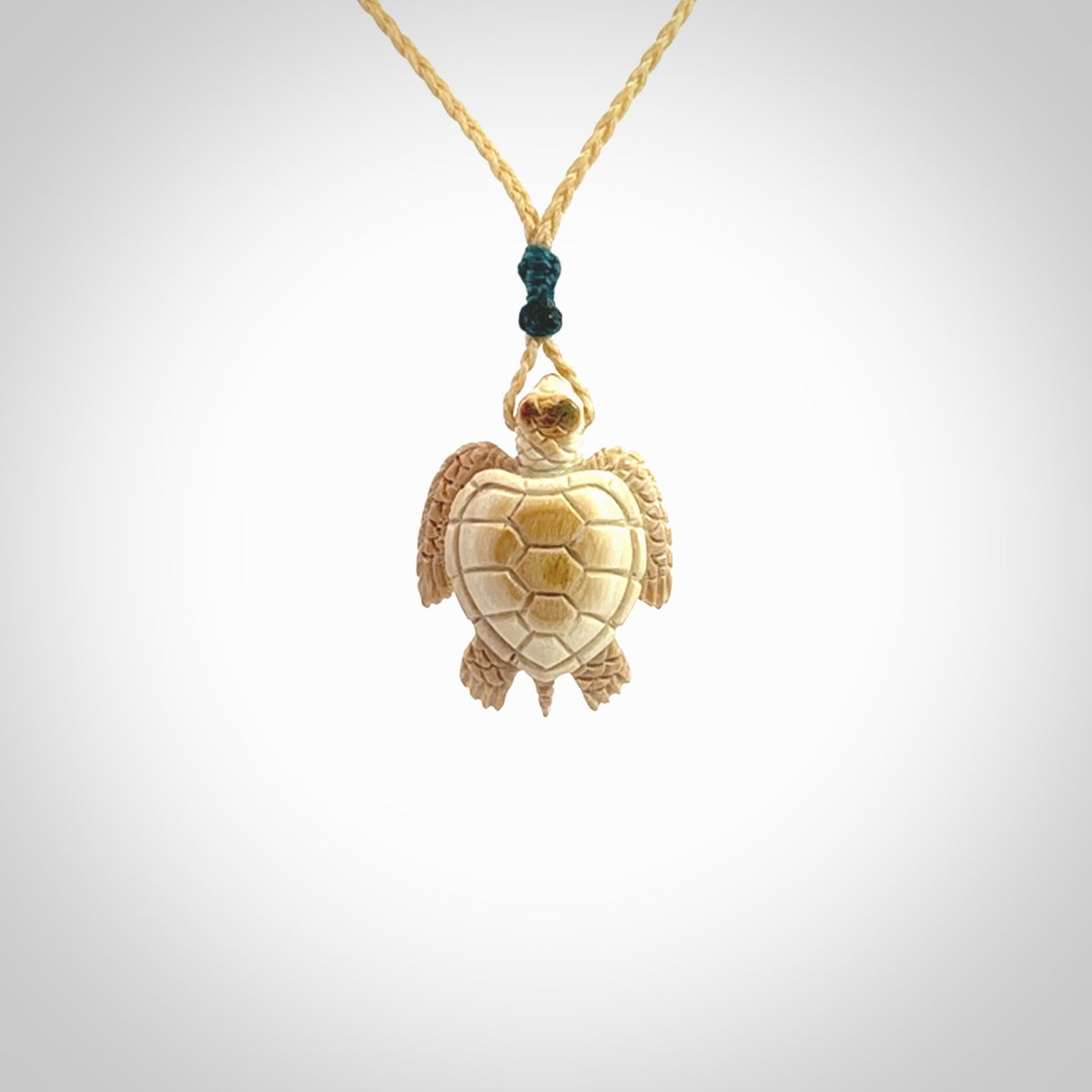 This is a beautiful hand carved woolly mammoth tusk turtle pendant. A really cool piece that is made from this rare and beautiful material. The mammoth has a very distinctive grain and each piece is different. We ship this worldwide and the cost of shipping is included in the price.