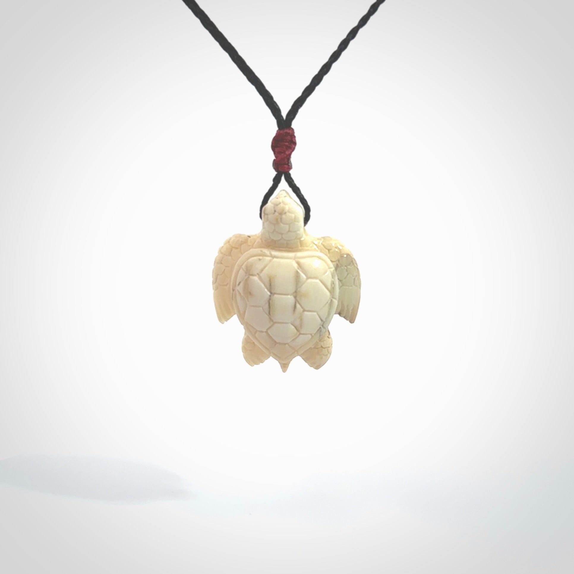 This is a beautiful hand carved woolly mammoth tusk turtle pendant. A really cool piece that is made from this rare and beautiful material. The mammoth has a very distinctive grain and each piece is different. We ship this worldwide and the cost of shipping is included in the price.